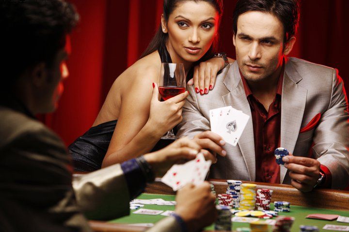 Each round features a physical wheel and real dealer interaction Real dealer spinning a roulette wheel at an m77 login studio